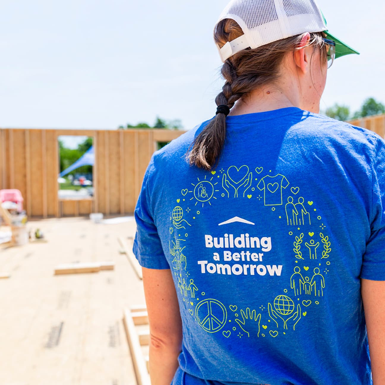 Clayton volunteers helping build a home together during a Habitat for Humanity Women Build event.